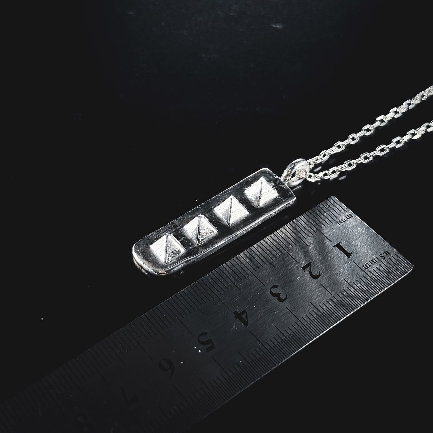 Four Spike Pendant